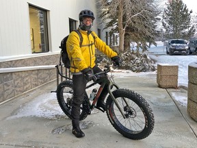 Mal Carroll is director of research for Syncrude and bikes 15 km to work each day.