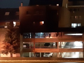 Edmonton Fire Rescue Services crews responded to multiple calls of a fire in a southwest Edmonton apartment parkade near 104 Street and 24 Avenue at around 10:30 p.m. Friday, Nov. 15, 2019. (Supplied photos/Leanne McLaren)
