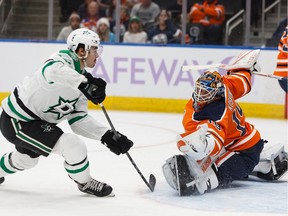 Edmonton Oilers' goaltender Mikko Koskinen (19) stops Dallas Stars' Nick Caamano (17) during the first period of a NHL hockey game at Rogers Place in Edmonton, on Saturday, Nov. 16, 2019. Photo by Ian Kucerak/IK Creative