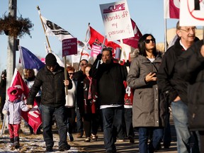 CUPE Locals 3550, 474 and 784 members hold an information picket and rally outside the Centre for Education in Edmonton, on Friday, Nov. 22, 2019. Photo by Ian Kucerak/Postmedia