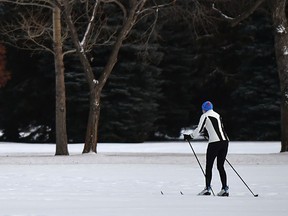 A cross country skier takes full advantage of the fallen snow while skiing at the Victoria Golf Course in Edmonton, November 26, 2019.