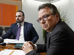 Alberta’s Auditor General Doug Wylie (right) released his Report of the Auditor General-November 2019 for tabling in the Legislative Assembly on Thursday, November 21, 2019. The report includes the results of the annual audit on the Consolidated Financial Statements of the Province of Alberta for the year ended March 31, 2019, as well as the results of the following five followup performance audits. Beside him was Eric Leonty (Assistant Auditor General of Alberta). (PHOTO BY LARRY WONG/POSTMEDIA)