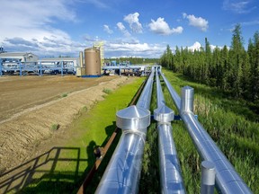 Pipes carry recovered bitumen from Devon Energy Corp.'s 35,000 barrel per day Jackfish Projects processing plant, where Steam Assisted Gravity Drainage (SAGD) is used to extract bitumen from oil sands, near Conklin, Alberta. file photo.