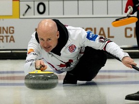 Skip Kevin Koe delivers a rock during game action against Team James Paul at the Alberta provincial men's curling championship held at the Ellerslie Curling Club in Edmonton on Thursday Feb. 7, 2019.