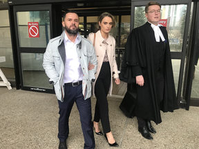 Bujar Rushiti, left, and Shqipe Rushiti leave the Edmonton courthouse with lawyer Anthony Oliver after a Court of Appeal hearing on Thursday, Nov. 14, 2019. Rushiti pleaded guilty last year to two offences related to the hiring of foreign workers, but now claims he did so with inadequate advice from his former lawyer.