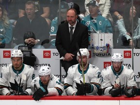 San Jose Sharks head coach Peter DeBor watches his team play the Colorado Avalanche on May 6, 2019, during their NHL playoff series.