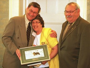 Edmontonian Jean Innes with then-MLA Ian McLelland (L) and government minister Stan Woloshyn after receiving an award at the fourth annual Minister's Seniors Service Awards on June 7, 2001.
