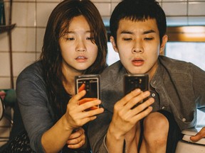 Woo-sik Choi and So-dam Park in Parasite.