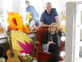 Victoria School of the Arts principal Tami Dowler Coltman and her husband drama department head Greg Dowler Coltman pose for a photo in a theatre dressing room at the school, in Edmonton Thursday June 27, 2019. The two are both retiring this week. Photo by David Bloom