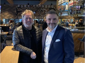 Celebrating 20 years of working together to create some of Edmonton's restaurant and bar hotspots were restaurateur Chris Lachance (left) and Chris Kourouniotis.