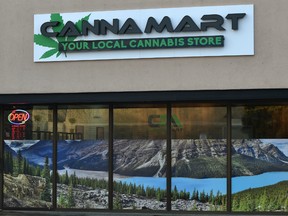 Cannamart, a cannabis store, has recently been hit by thieves. Now a store manager has partially torn down Cannamart's window coverings on Monday, Dec. 30, 2019, because he says they posed a safety threat to his employees.