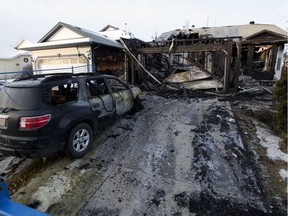 The scene of a house fire along 136 Street and 129 Avenue, Monday Dec. 9, 2019. Photo by David Bloom