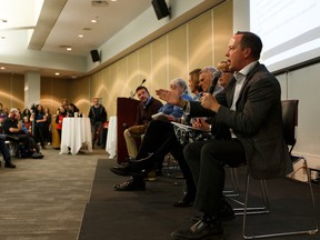 Mike Parker, president of the Health Sciences Association of Alberta speaks next to other labour leaders during the Join the Resistance Town Hall at MacEwan University in Edmonton, on Monday, Dec. 2, 2019. Photo by Ian Kucerak/Postmedia