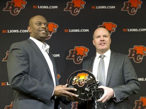B.C. Lions general manager Ed Hervey (left) announced the hiring of Rick Campbell (right) as the CFL team's new head coach at the team's Surrey training facility on Dec. 2, 2019. [PNG Merlin Archive] ORG XMIT: POS1912021614370827