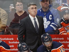 Edmonton Oilers head coach Dave Tippett watches the clock during NHL hockey game action against the Toronto Maple Leafs in Edmonton on Saturday December 14, 2019.