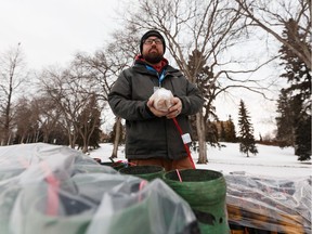 Robbie MacKeen with Fireworks Spectaculars Canada shows a five inch shell during a press conference about Edmonton's New Years' fireworks show at the Alberta Legislature in Edmonton, on Tuesday, Dec. 31, 2019.