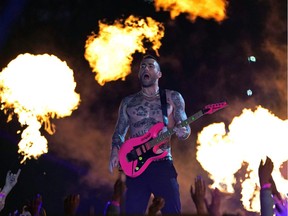 A topless Adam Levine of Maroon 5 during the halftime show of Super Bowl this year. Sports!