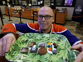 Norm Hollingsworth, owner of Mind-Full The Cannabis Store, displays some sample non-dosed edibles that look like some of those that will be for sale in January 2020. (PHOTO BY LARRY WONG/POSTMEDIA)
