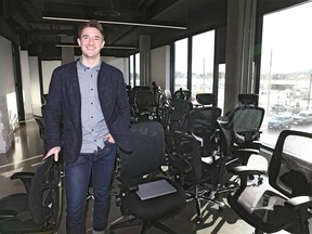 Chris Simair poses in his new office space in southeast Calgary on Tuesday, December 3, 2019. The office is in the finishing stages but they hope to move into the space on Confluence Way SE in the next week or so. Jim Wells/Postmedia