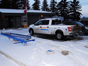 Kitscoty RCMP are searching for a white or silver Dodge pickup truck they believe to be involved in a hit-and-run at the Kitscoty RCMP Detachment that caused extensive damage to a sign and parked police truck.  IMAGE SUPPLIED BY RCMP