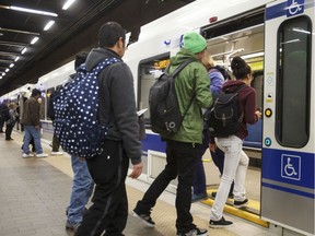 Passengers ride the LRT at Churchill Station in Edmonton, Alta. File photo.