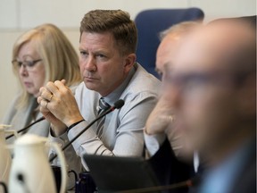 Ward 9 councillor Tim Cartmell takes part in an emergency budget meeting at City Hall, a day after the province unveiled $7 million in cuts to the city's funding, in Edmonton Friday Oct. 25, 2019. File photo.