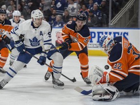Anthony Stolarz (32)of the Edmonton Oilers, makes a save on John Tavares (91) of the Toronto Maple Leafs at Rogers Place in Edmonton on March 9, 2018.