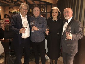 Italian winemaker Joe Giusti, left, Sorrentino's restaurant owner Carnelo Rago, centre left; Maria Giusti, and Downtown Sorrentino's restaurant manager Michael Sayde at Sorrentino's annual Truffle dinner. Giusti brought his 2014 Amaroni, voted the best in the world, for guests to pair with their venison tenderloin.