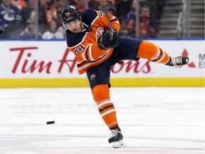 The Edmonton Oilers' Ethan Bear (74) makes a pass during third period NHL action against the Vancouver Canucks, in Edmonton Saturday Nov. 30, 2019. Vancouver won 5-2. Photo by David Bloom