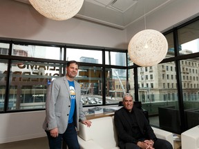 Co-founder of AltaML, Cory Janssen (left), and President and CEO of Williams Engineering Naseem Bashir pose for a photo at Williams Engineering's office in Edmonton, on Thursday, Dec. 19, 2019. Photo by Ian Kucerak/Postmedia