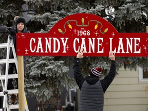 Christine Chan and Will Chan begin to take down their Candy Cane Lane decorations, in Edmonton Saturday Jan. 4, 2020. Photo by David Bloom
