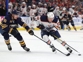 Joakim Nygard #10 of the Edmonton Oilers skates with the puck as Rasmus Ristolainen #55 of the Buffalo Sabres defends during the first period at KeyBank Center on Jan. 2, 2020 in Buffalo, New York.