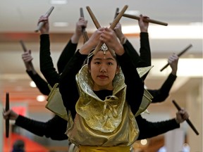 Kim Berlee performs a "Thousand Hands" dance at Kingway Mall, where the Chinese Benevolent Association of Edmonton and the Edmonton Chinese Bilingual Education Association held a lunar new year celebration on Sunday February 3, 2019.