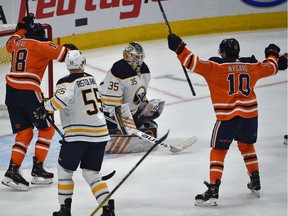 Edmonton Oilers Joakim Nygard (10) scores on Buffalo Sabres goalie Linus Ullmark (35) on a tip in during NHL action at Rogers Place in Edmonton, December 8, 2019.