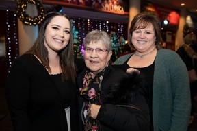 (From left) Hannah Lavigne, Annette Lavigne and Bonnie Lavigne during the final performance of the Singing Christmas Tree.