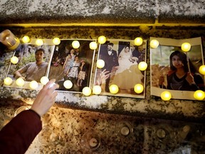 More than 100 people attended a candlelight vigil on the steps outside the Alberta legislature in Edmonton on Wednesday, Jan. 8, 2020 in memory of the victims of the Ukraine International Airlines crash near Tehran, Iran.