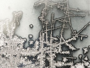 Ice forms on a window of a home in Edmonton, on Thursday, Jan. 9, 2020. The Capital Region experienced cold winter conditions after the first major snowstorm of 2020 hit overnight on Jan. 8.