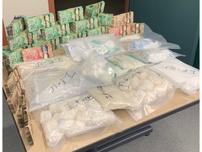 Edmonton police seized cocaine, methamphetamines and cash in north Edmonton last Sunday, Jan. 5, 2020.