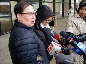 Family friend Luci Johnson, left, speaks to media with Dalyce Raine, whose son Anthony died in April 2017, outside of the Edmonton courthouse on Friday, Jan. 10, 2020. Anthony's father was found guilty of manslaughter in connection to the death.