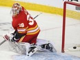 The Oilers first goal of the game slips by Flames goalie Cam Talbot during NHL action between the Edmonton Oilers and the Calgary Flames in Calgary on Saturday, Jan. 11, 2020.