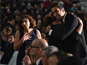 An outpouring of grief during the public memorial service to remember victims of last week's air crash outside Tehran, Iran, 13 from Edmonton, 31 from Alberta of the 138 people destined for Canada, at the Saville Community Sports Centre in Edmonton, Jan. 12, 2020.