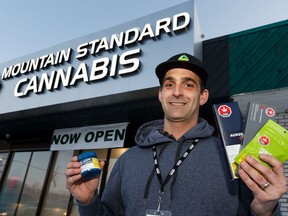 Curtis Martel, President Mountain Standard Cannabis, poses for a photo with the 9729 118 Ave store's first shipment of cannabis edibles in Edmonton, on Monday, Jan. 13, 2020. Photo by Ian Kucerak/Postmedia