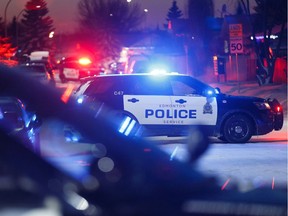 Edmonton Police Service vehicles blocking a road in Edmonton, on Friday, Jan. 17, 2020.