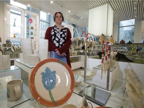 Karen Bishop, an Edmonton member of the Alberta Arts Matter Coalition poses for a photo in the Alberta Branded shop in the Federal Building.