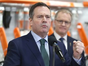 Alberta Premier Jason Kenney gestures as he speaks at Arn's Equipment in Calgary on Tuesday, January 21, 2020.