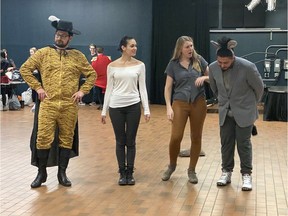 From left to right: Puss in Boots (Joel Mcleish), Princess Fiona (Samantha Fraughton), Shrek (Gilliane Hardy-Legault), Donkey (Tunahan Uygun) rehearse a scene in the play Shrek: Law and Ogre put on by the Law Show Committee at the University of Alberta. Submitted photo.