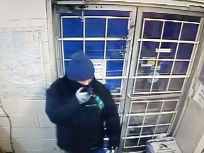 Photo of suspect in an armed robbery on Jan. 3, 2020, at a store in Ashmont, Alta.
