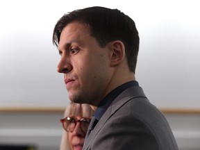 Matthew McKnight and his mother listen as his attorney speaks to the media at the Edmonton Law Courts, Thursday, January 16, 2020 David Bloom/Postmedia