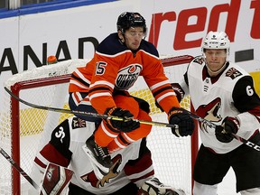 Edmonton Oilers Josh Archibald leaps in front of Arizona Coyotes goalie Antii Raanta and defenceman Jakob Chychrun during NHL hockey game action in Edmonton on Saturday January 18, 2020. (PHOTO BY LARRY WONG/POSTMEDIA)