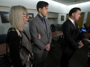 Matthew McKnight and his mother watch as his lawyer Dino Bottos speaks to the media after McKnight was convicted on five of the 13 counts of sexual assault he faced on Thursday, Jan. 16, 2020.